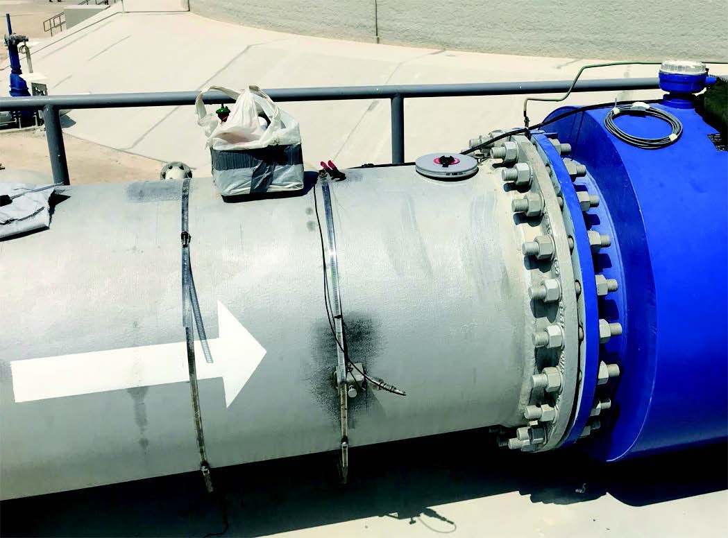 AquaTrans AT600 clamp-on flow meter installed on a 720 mm sewage pipe