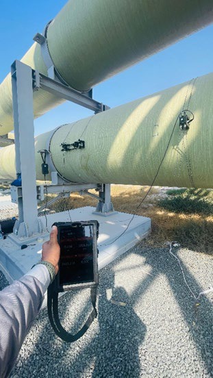 PT900 clamp-on flow meter with transducers on a DN1200 GRP pipe